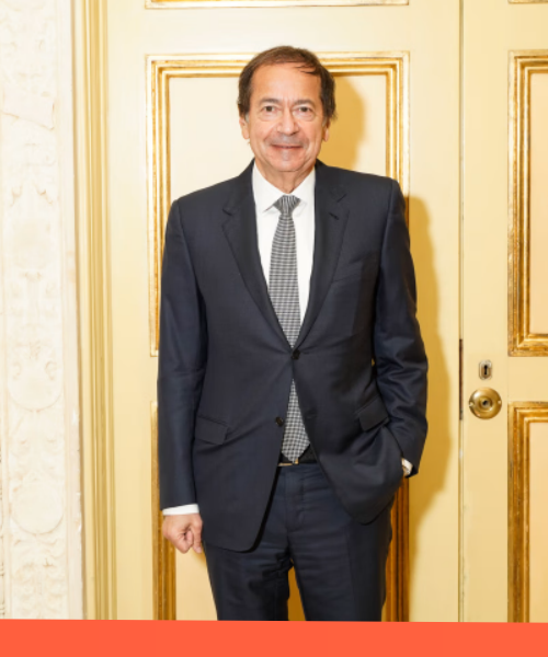 John Paulson and Ulf Mark Schneider